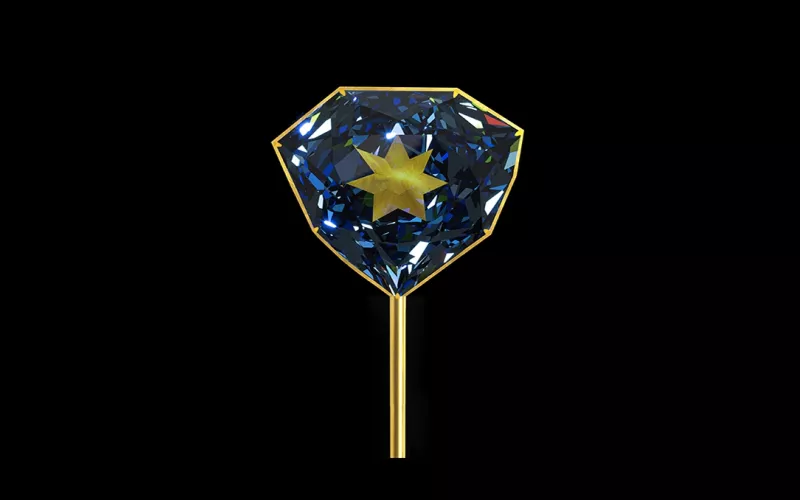 Diamant bleu orné d'une étoile dorée.